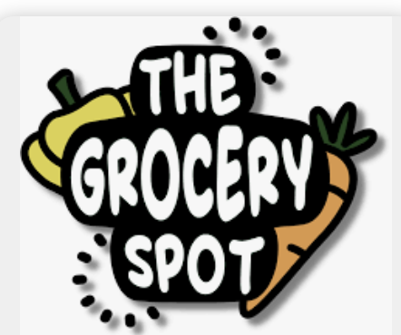  Wording - The Grocery spot with orange carrots and yellow bell pepper in the background.